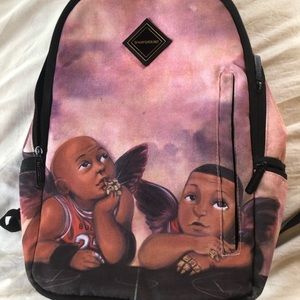 spray ground angel backpack